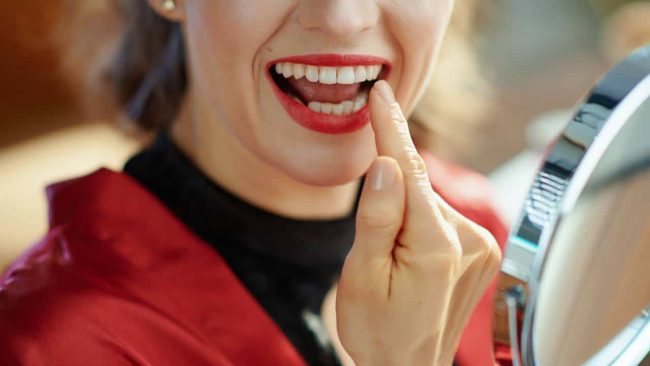 women showing her teeth